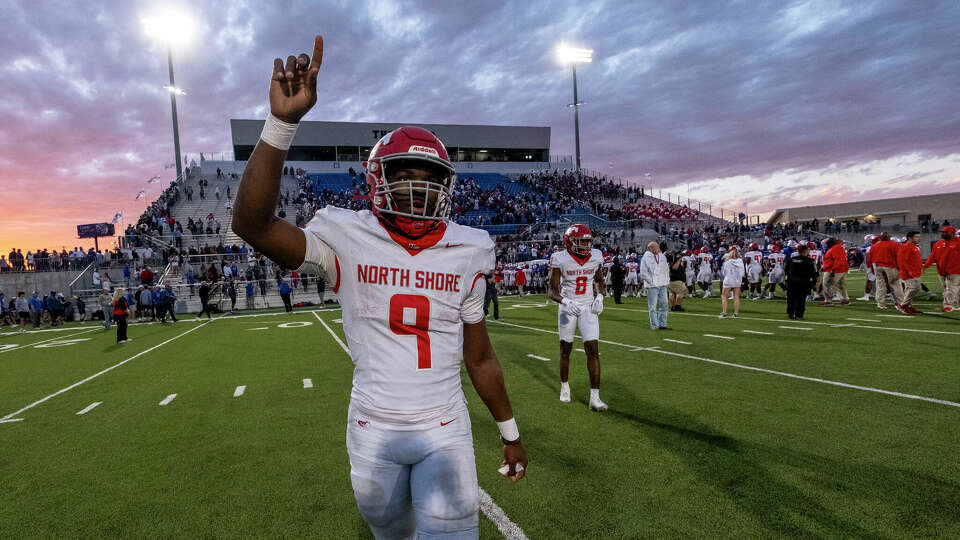 North Shore Kaleb Bailey, (9), walks back to the team sideline after shaking hands with the Austin Westlake team after winning the 6A UIL high school football semifinal held in Pflugerville, Texas, on Saturday, December 9, 2023. North Shore defeated Austin Westlake 23-14.