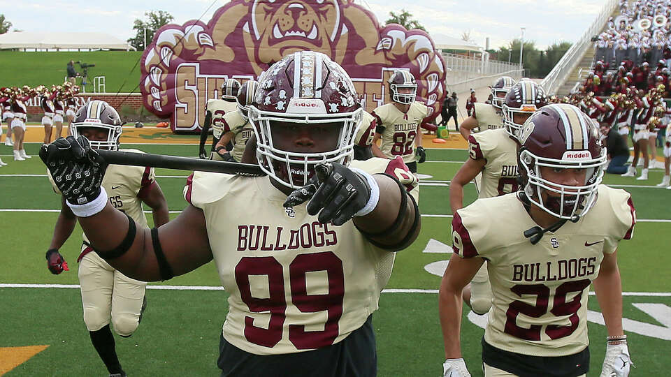 Summer Creek's Josiah Pratt (99) runs onto the field with his teammates as they face Cibolo Steele in a Class 6A Division II state semifinal game Saturday, Dec. 9, 2023, in Waco, Texas.