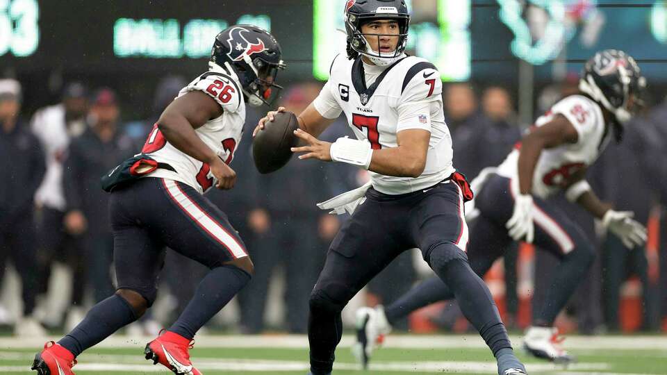 Houston Texans quarterback C.J. Stroud (7) steps back to pass against the New York Jets during the first quarter of an NFL football game, Sunday, Dec. 10, 2023, in East Rutherford, N.J. (AP Photo/Adam Hunger)