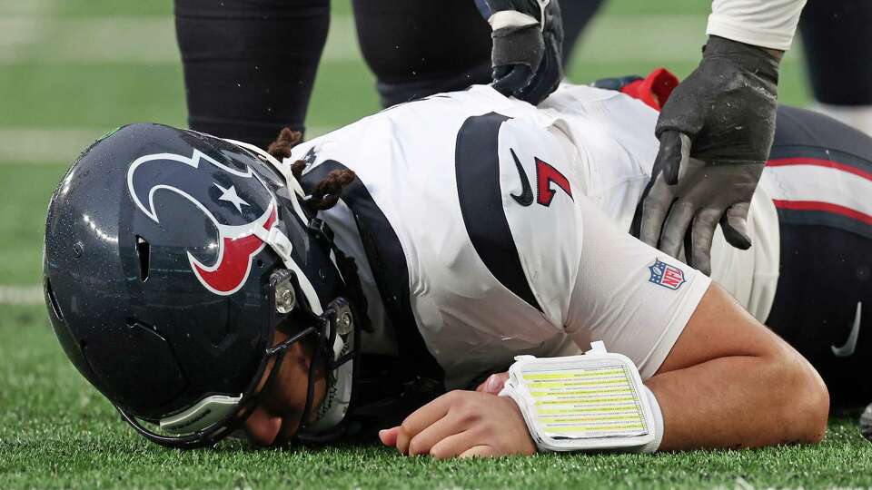 EAST RUTHERFORD, NEW JERSEY - DECEMBER 10: C.J. Stroud #7 of the Houston Texans on the field after a play during the fourth quarter in the game against the New York Jets at MetLife Stadium on December 10, 2023 in East Rutherford, New Jersey.