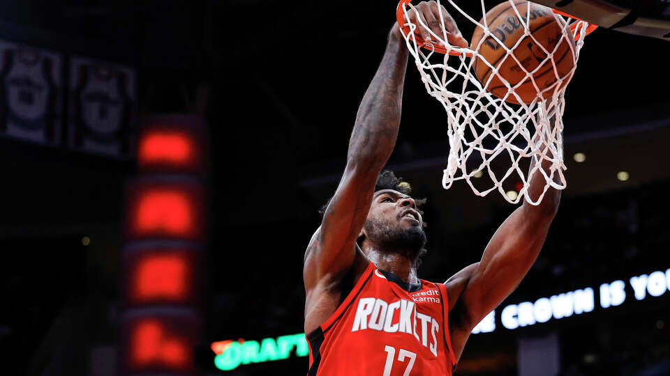 Tari Eason #17 of the Houston Rockets dunks the ball against the San Antonio Spurs during the second half at Toyota Center on December 11, 2023 in Houston, Texas. (Photo by Carmen Mandato/Getty Images)