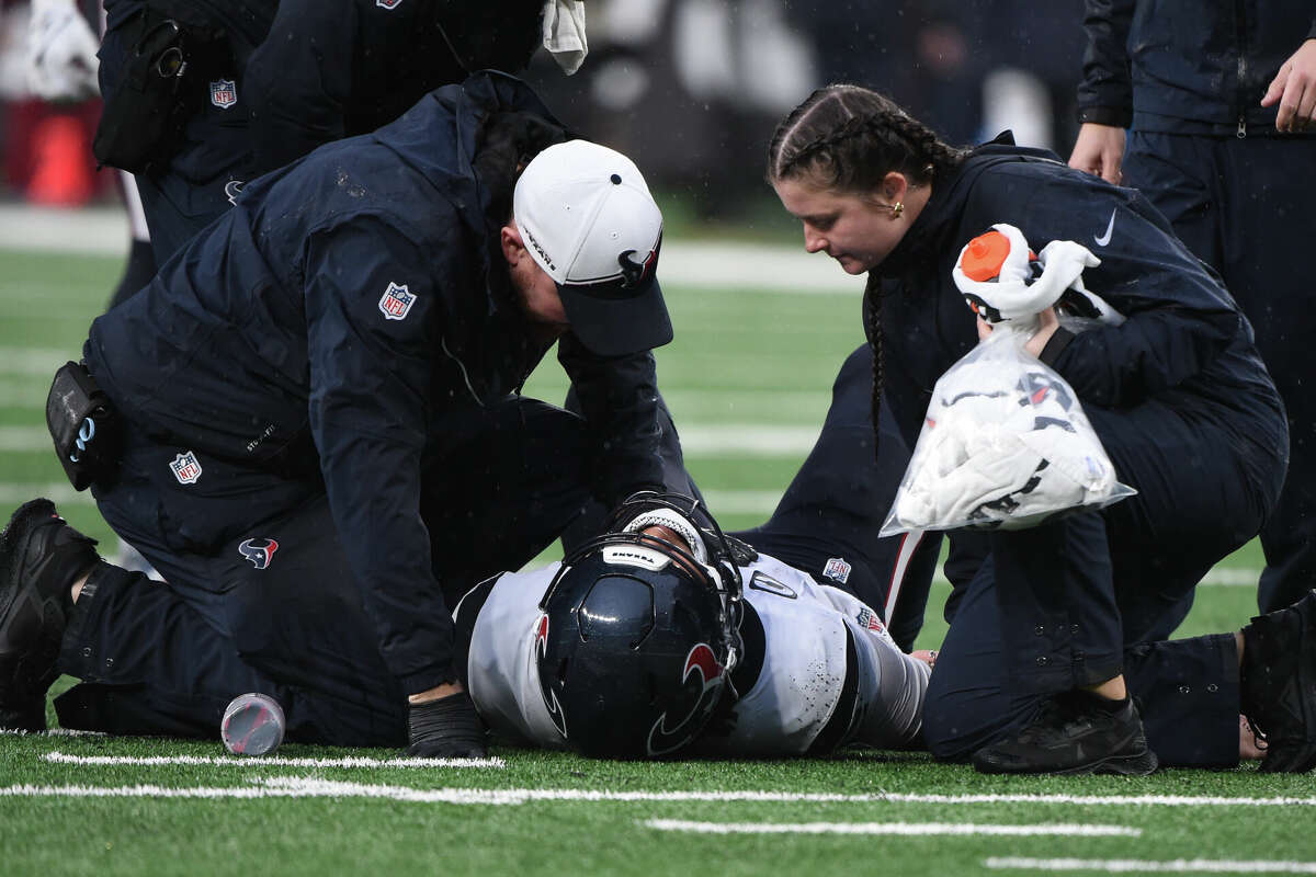 Houston Texans QB C. J. Stroud (7) lays on the ground injured during game featuring the Houston Texans and the New York Jets on December 10, 2023 at MetLife Stadium in East Rutherford, NJ.