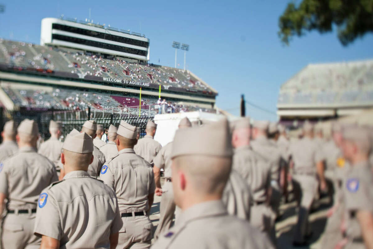 Texas A&M University's Corp of Cadets marching band march to Kyle Field as Aggie fans line the streets before aNCAA football game , Oct. 15, 2011, in College Station. ( Nick de la Torre / Houston Chronicle ) (Photo by Nick de la Torre/Houston Chronicle via Getty Images)