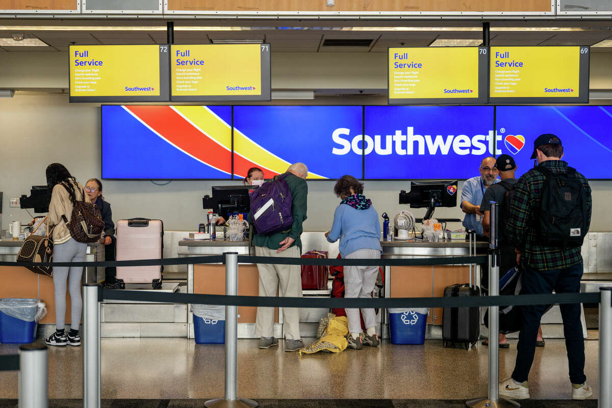 Passengers check-in for Southwest Airlines flights at the Austin-Bergstrom International Airport on April 18, 2023 in Austin, Texas. 