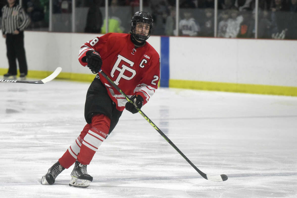 Fairfield Prep's Ralfs Viguls (28) skates against New Canaan during a boys ice hockey game at the Darien Ice House on Friday, Dec. 15, 2023.