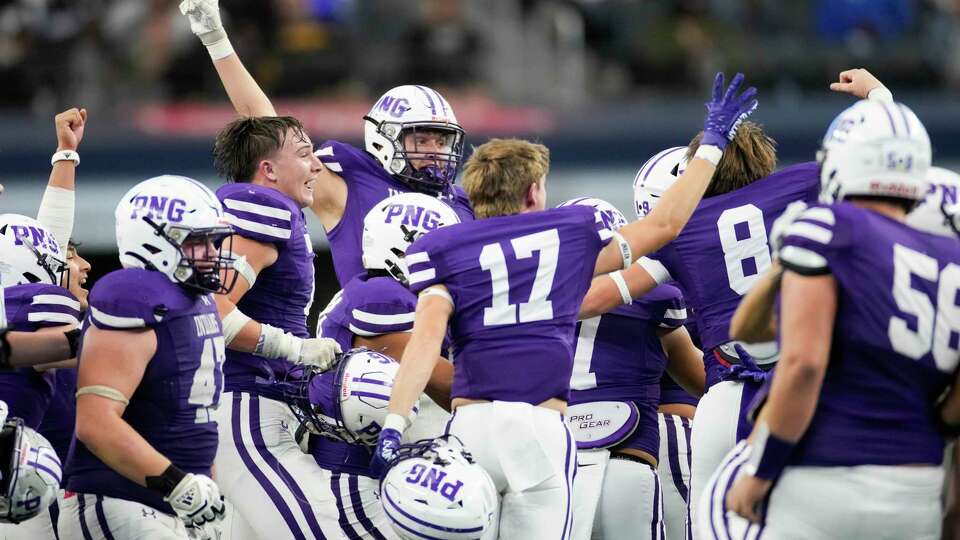 PNG players reacts after defeating Dallas South Oak Cliff 20-17 to win the 5A Division 2 UIL state championship game at AT&T Stadium, Saturday, Dec. 16, 2023, in Arlington.