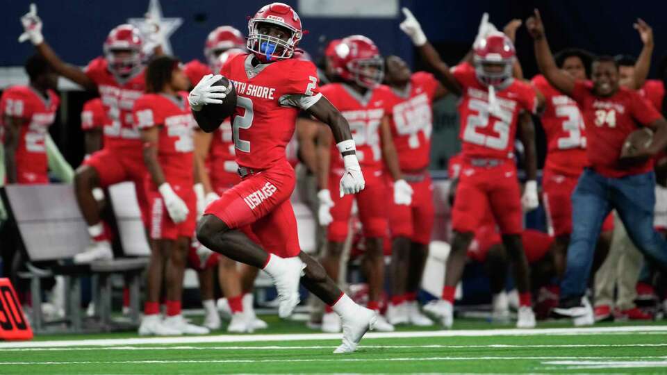 North Shore wide receiver Christopher Barnes (2) returns a kickoff for a 98-yard touchdown during the second half of the 6A Division I UIL state championship game at AT&T Stadium, Saturday, Dec. 16, 2023, in Arlington.