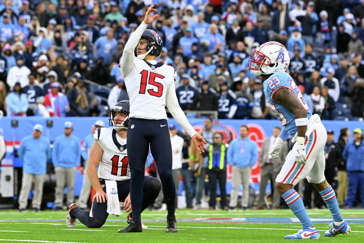 Houston Texans place kicker Ka'imi Fairbairn (15) watches his game-winning field goal during overtime of an NFL football game against the Tennessee Titans, Sunday, Dec. 17, 2023, in Nashville, Tenn.