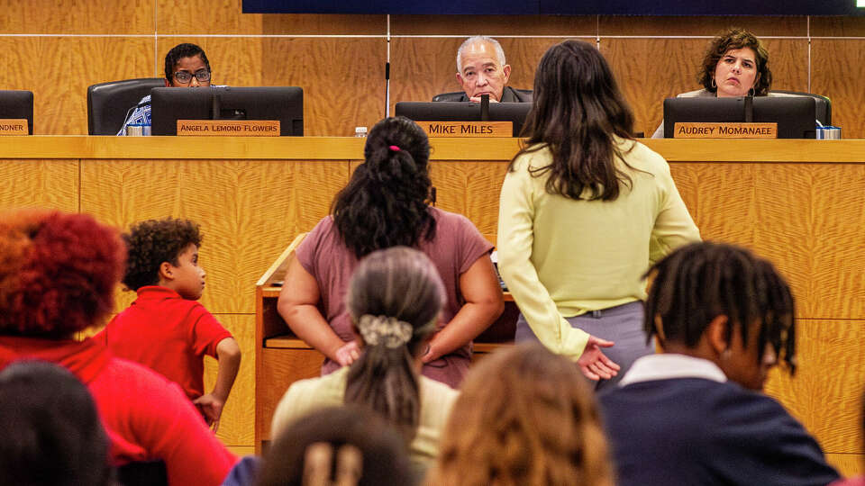 Speaking through a translator, Celina Manzano, speaks to the Houston Independent School District, Board of Managers, during a meeting Thursday, Nov. 9, 2023 in Houston.