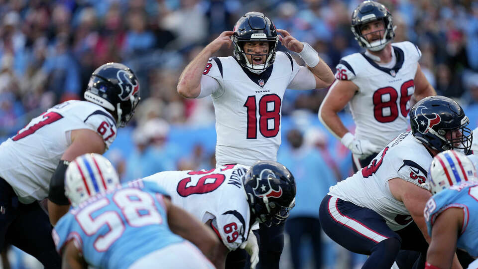 Houston Texans quarterback Case Keenum (18) adjusts a play during the second half of an NFL football game against the Tennessee Titans on Sunday, Dec. 17, 2023 in Nashville, Tenn.