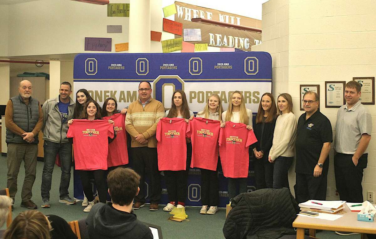 Onekama volleyball recognized at school board meeting