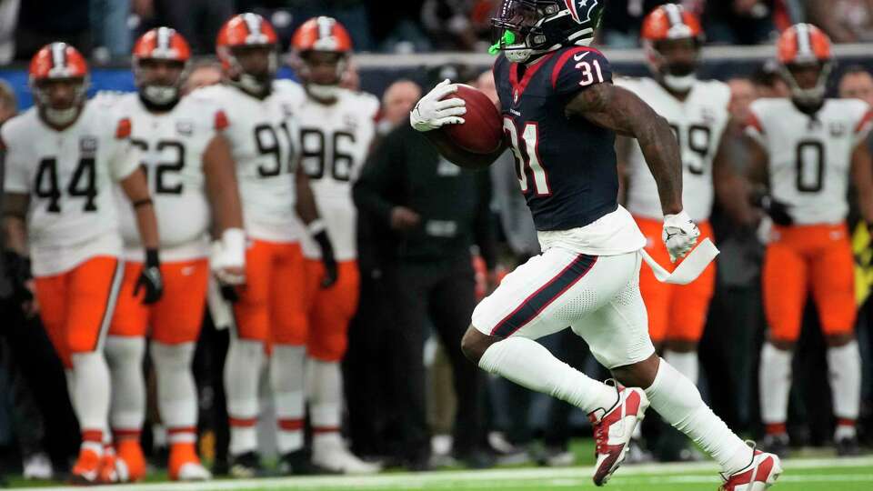 Houston Texans running back Dameon Pierce (31) runs to score a 98 yards touchdown during the second quarter of a NFL game on Sunday, Dec. 24, 2023 at NRG Stadium in Houston.