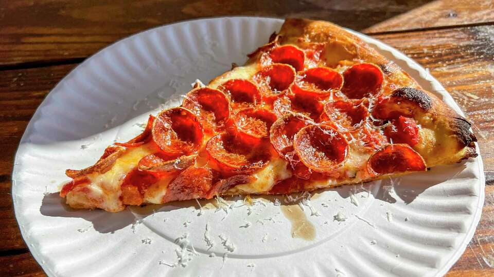 A slice of pepperoni pizza from Neighbors, a restaurant in the East End, on Dec. 27, 2023.