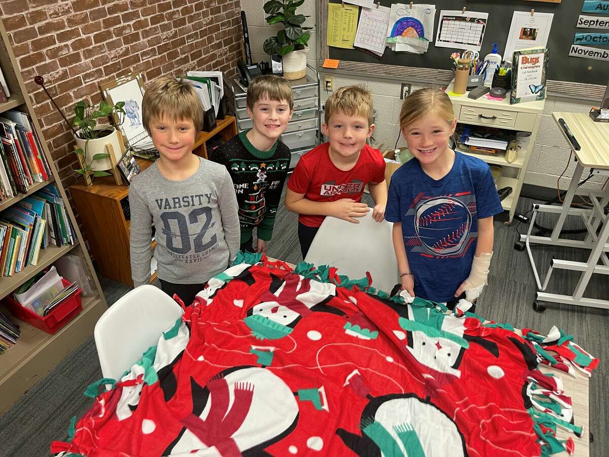 Big Rapids Board Member Makes Blankets With Elementary Students