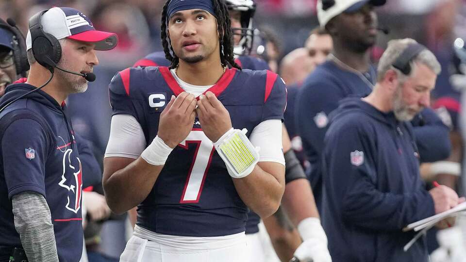 Houston Texans quarterback C.J. Stroud (7) stands on the sidelines in the last few minutes of the fourth quarter against the Tennessee Titans in the second half of NFL game action at NRG Stadium on Sunday, Dec. 31, 2023 in Houston. Houston Texans won the game 26-3.