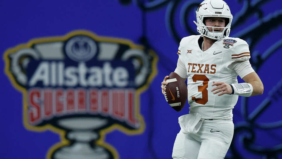 NEW ORLEANS, LOUISIANA - JANUARY 01: Quinn Ewers #3 of the Texas Longhorns looks to pass during the first quarter against the Washington Huskies during the CFP Semifinal Allstate Sugar Bowl at Caesars Superdome on January 01, 2024 in New Orleans, Louisiana. (Photo by Chris Graythen/Getty Images)