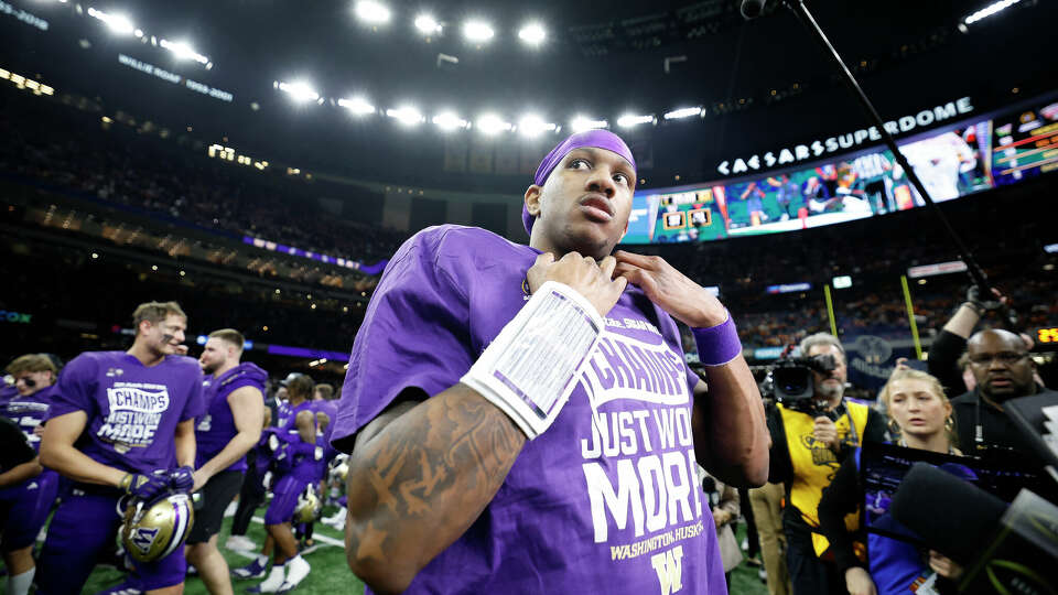 NEW ORLEANS, LOUISIANA - JANUARY 01: Michael Penix Jr. #9 of the Washington Huskies celebrates after a 37-31 victory against the Texas Longhorns in the CFP Semifinal Allstate Sugar Bowl at Caesars Superdome on January 01, 2024 in New Orleans, Louisiana. (Photo by Chris Graythen/Getty Images)