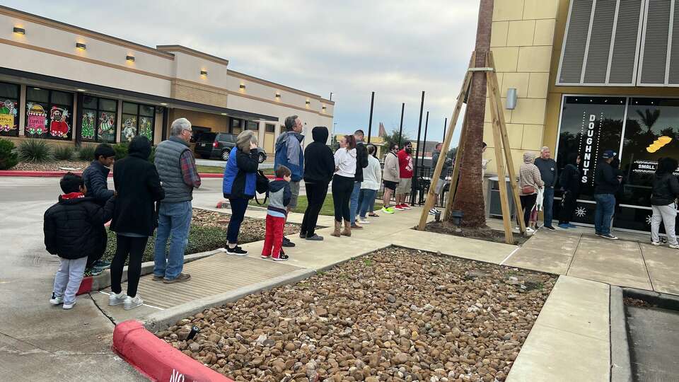 The line recently at Parlor Doughnuts in Nassau Bay. The Indiana-based chain is known for layered donuts with no holes. The donuts come in 27 different flavors. 