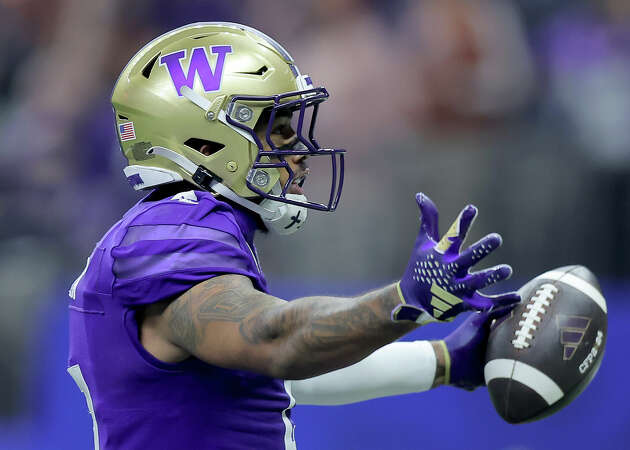 Ja'Lynn Polk #2 of the Washington Huskies celebrates after a touchdown during the second quarter against the Texas Longhorns during the CFP Semifinal Allstate Sugar Bowl at Caesars Superdome on January 01, 2024 in New Orleans, Louisiana.