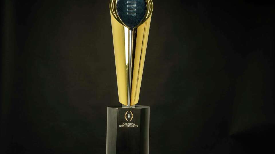 The College Football Playoff National Championship trophy is shown in the Chronicle Studio on Thursday, Jan. 4, 2024 in Houston.