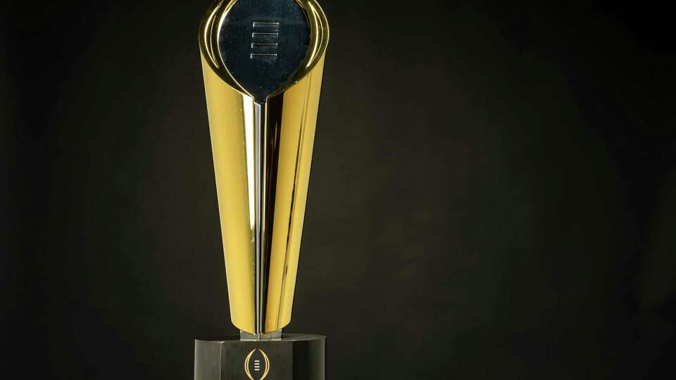 The College Football Playoff National Championship trophy is shown in the Chronicle Studio on Thursday, Jan. 4, 2024 in Houston.