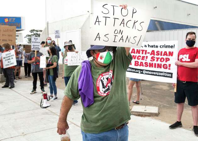 Victor Ibarra marches with other demonstrators as they gather for a rally for a National Day of Action demanding an end to hate crimes targeting Asian American communities Saturday, March 27, 2021 in Houston.