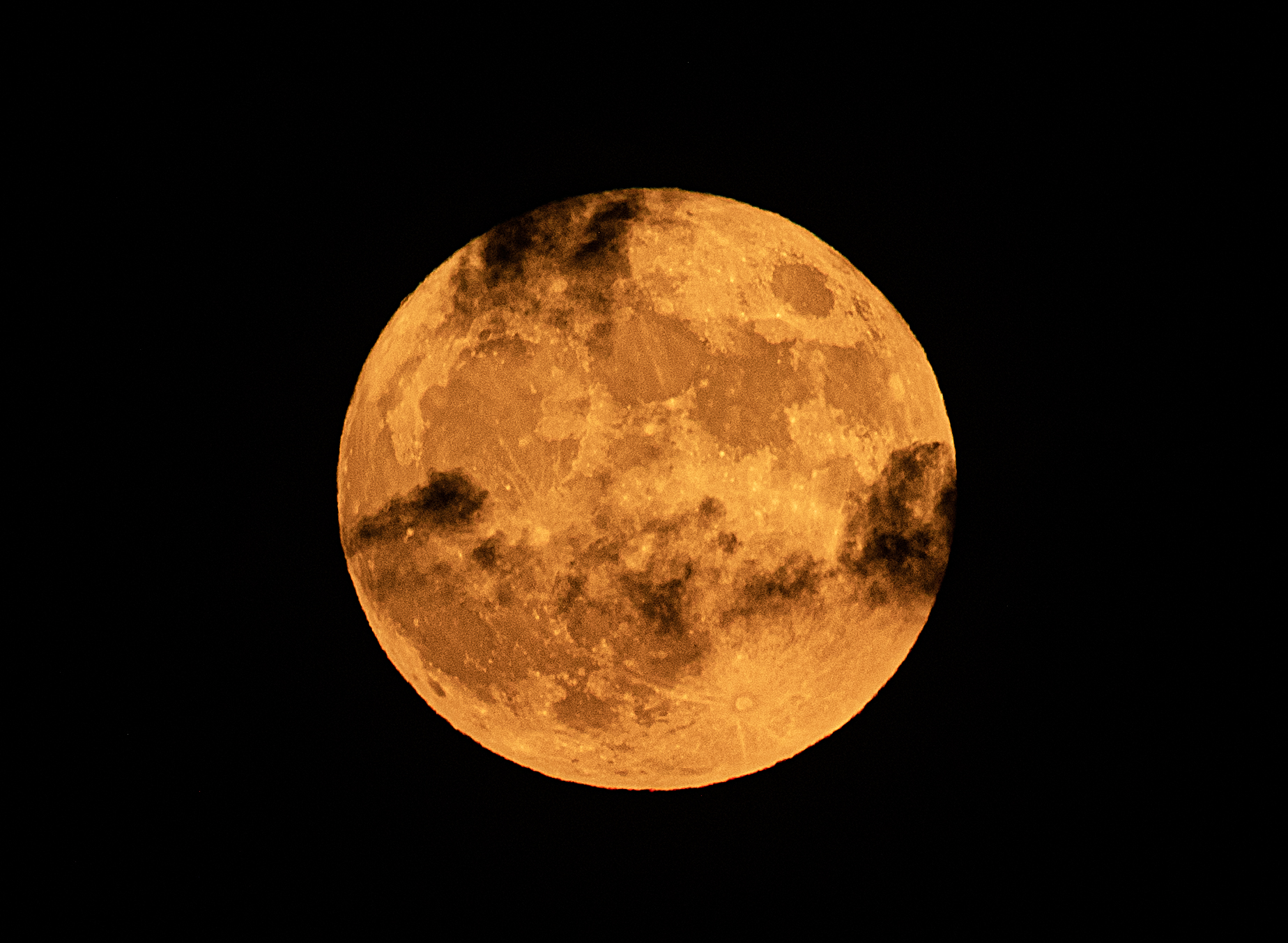 September's full moon highlighted by a partial lunar eclipse