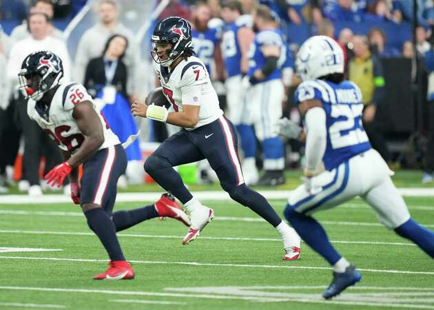 Houston Texans quarterback C.J. Stroud (7) runs the ball during the second half of an NFL football game Saturday, Jan. 6, 2024, in Indianapolis.