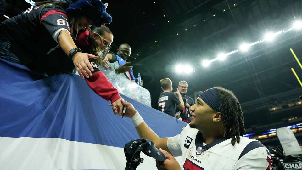 Houston Texans quarterback C.J. Stroud (7) visits with fans after clinching a playoff spot with a 23-19 win over the Indianapolis Colts during an NFL football game Saturday, Jan. 6, 2024, in Indianapolis.