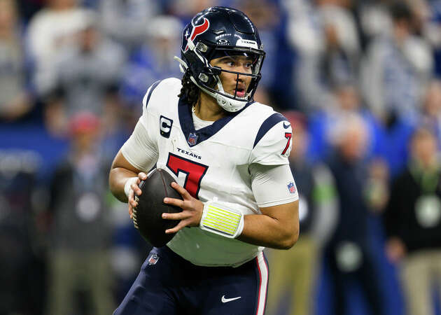 Houston Texans quarterback C.J. Stroud (7) scrambles from pressure during an NFL football game against the Indianapolis Colts, Saturday, Jan. 6, 2024, in Indianapolis.