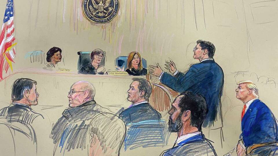 This artist sketch depicts former President Donald Trump, seated right, listening as his attorney D. John Sauer, standing, speaks before the D.C. Circuit Court of Appeals at the federal courthouse, Tuesday, Jan. 9, 2024 in Washington. (Dana Verkouteren via AP)