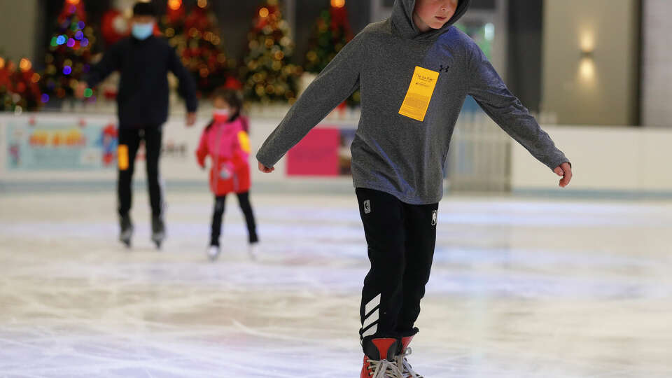 Hayden Williams skates during the opening of annual ice rink at The Cynthia Woods Mitchell Pavilion, Friday, Nov. 19, 2021, in The Woodlands.