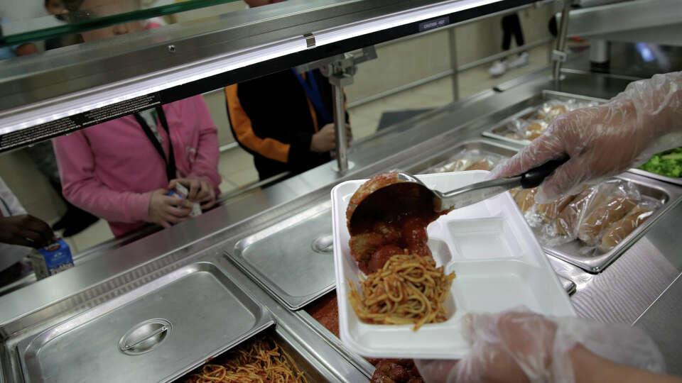 Fourth graders at Hancock Elementary School have their lunch served on Thursday, April 6, 2017, in Houston. The school offers a program where parents can put extra money in the funds so students who forget their lunch money get a full meal. ( Elizabeth Conley / Houston Chronicle )