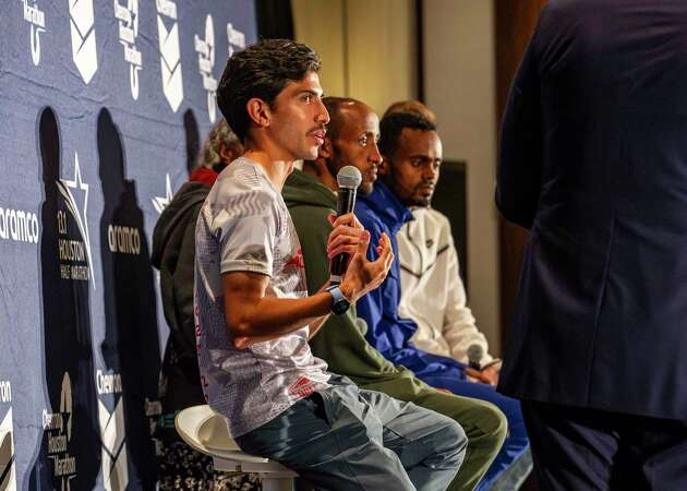 Houston news and sports anchor Greg Bailey moderates as Armco Houston Half Marathon elite athletes, Frank Lara, Jemal Yimer, Milkesa Mengasha and Galen Rupp make comments and field questions during a pre-race press conference, Friday, Jan. 12, 2024, in Houston.