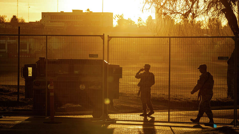 Texas Department of Public Safety officers guard an entrance to Shelby Park on Thursday, Jan. 11, 2024, in Eagle Pass, Texas. Gov. Greg Abbott signed an emergency declaration allowing state troopers to take over the park, located on the banks of the Rio Grande, without permission from the city of Eagle Pass, according to its Mayor Rolando Salinas.