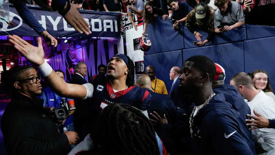 Houston Texans quarterback C.J. Stroud (7) celebrates with fans after defeating Cleveland 45-14 during an AFC Wild Card football game at NRG Stadium on Saturday, Jan. 13, 2024, in Houston.