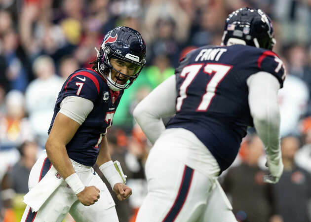 C.J. Stroud #7 of the Houston Texans celebrates after a touchdown during an NFL wild-card playoff football game between the Houston Texans and the Cleveland Browns at NRG Stadium on January 13, 2024 in Houston, Texas.