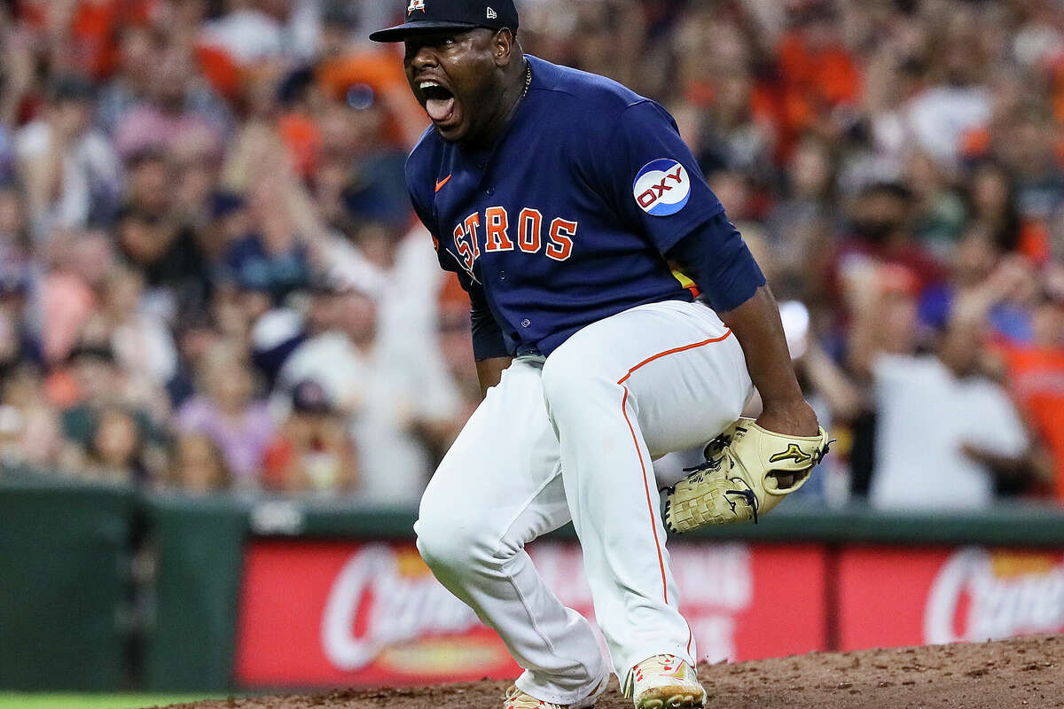 Hector Neris #50 of the Houston Astros reacts after striking out Jose Caballero #76 of the Seattle Mariners with the bases loaded in the eighth inning at Minute Maid Park on July 08, 2023 in Houston, Texas. 