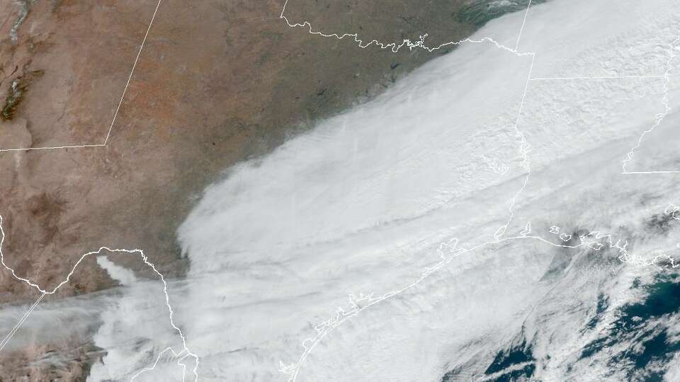 Southeast Texas remains obscured by clouds in this weather satelllite image taken at 12:30 p.m. Monday. But Tuesday's forecast calls for clearing skies as high atmospheric pressure moves into the region.