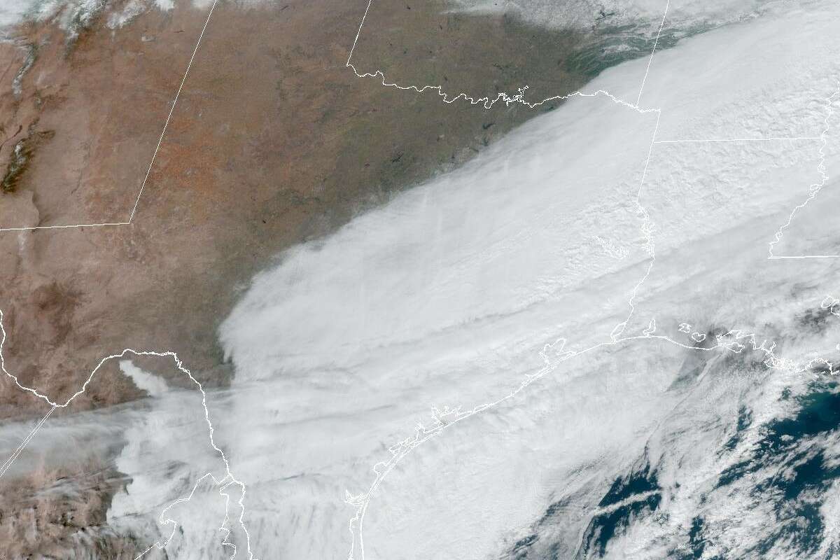 Southeast Texas remains obscured by clouds in this weather satelllite image taken at 12:30 p.m. Monday. But Tuesday's forecast calls for clearing skies as high atmospheric pressure moves into the region.