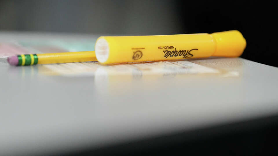 A highlighter on a work desk is photogarphed at Audrey H. Lawson Middle School Wednesday, Sept. 6, 2023 in Houston.