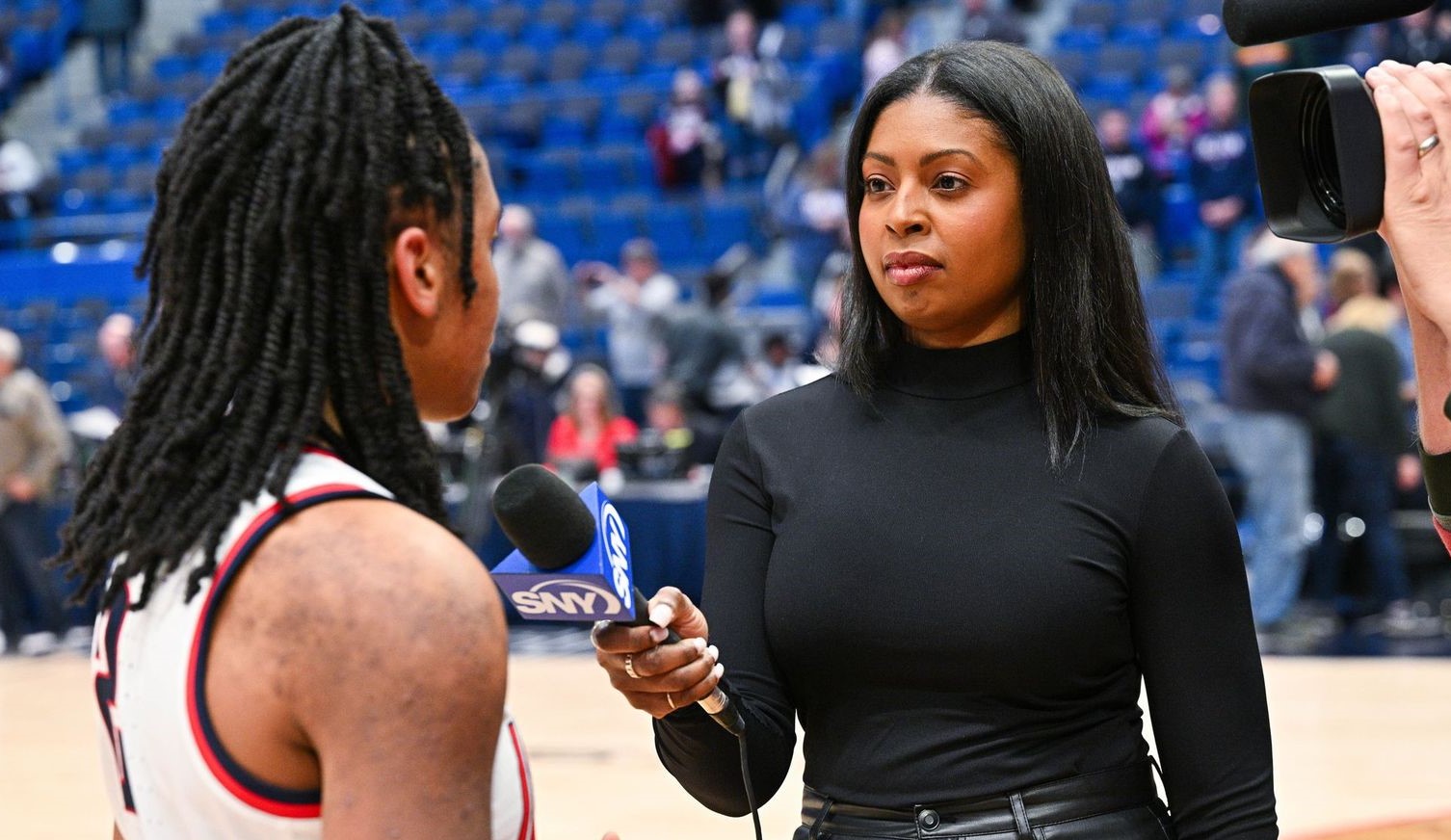 CT native Chelsea Sherrod reports on UConn women's basketball for SNY