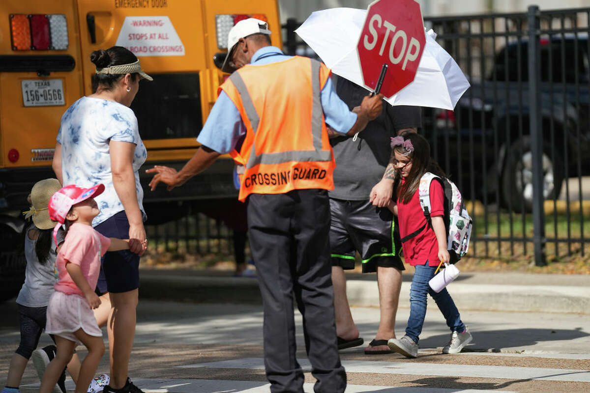 HOUSTON, TEXAS - OCTOBER 25: Students are dismissed from Benbrook Elementary on Wednesday, Oct. 25, 2023 in Houston. (Elizabeth Conley/Houston Chronicle via Getty Images)