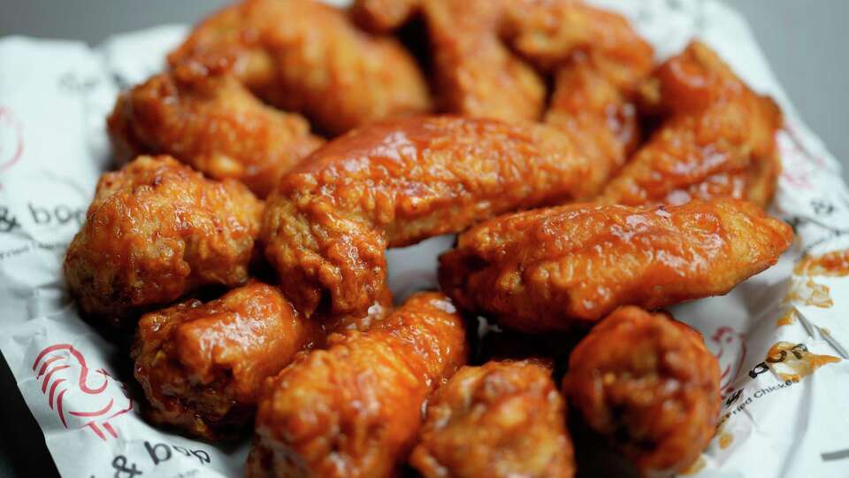 Sriracha Tony wings are shown at Dak & Bop, 1801 Binz St., Suite 120, Wednesday, Jan. 17, 2024, in Houston. The Korean fried chicken restaurant is owned by Jason Cho.