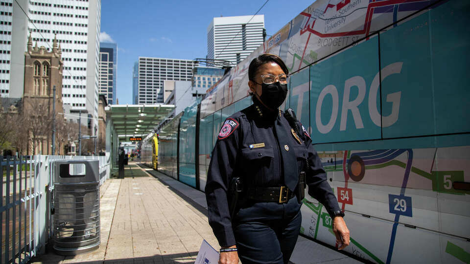 METRO police chief Vera Bumpers walks by the METRO Light Rail platform on her way to the METRO administrative office, Tuesday, March 22, 2022, in Houston.