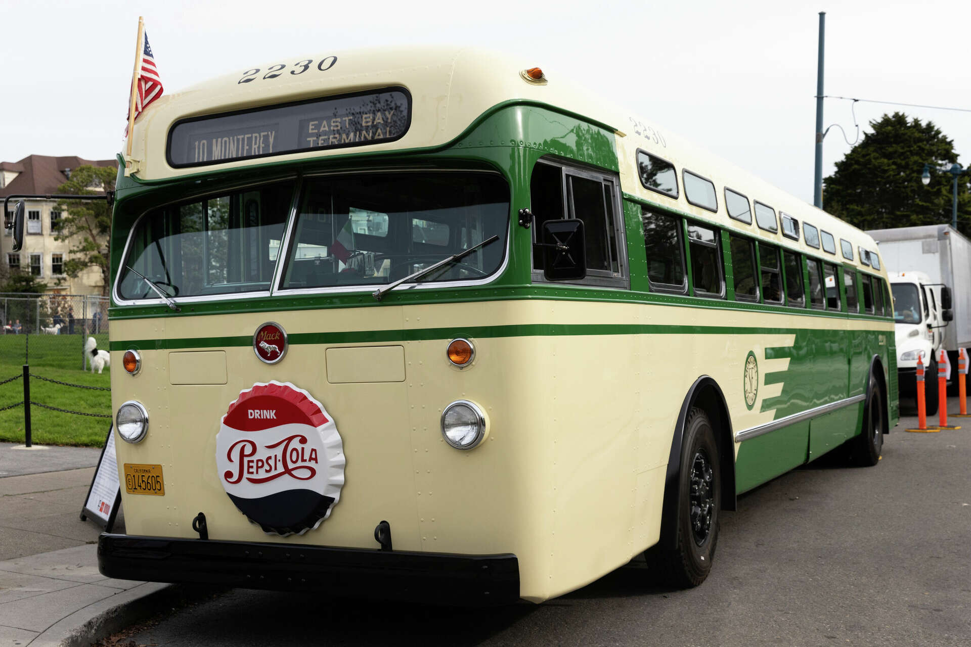 SF Muni travels back in time with vintage bus, archival photos