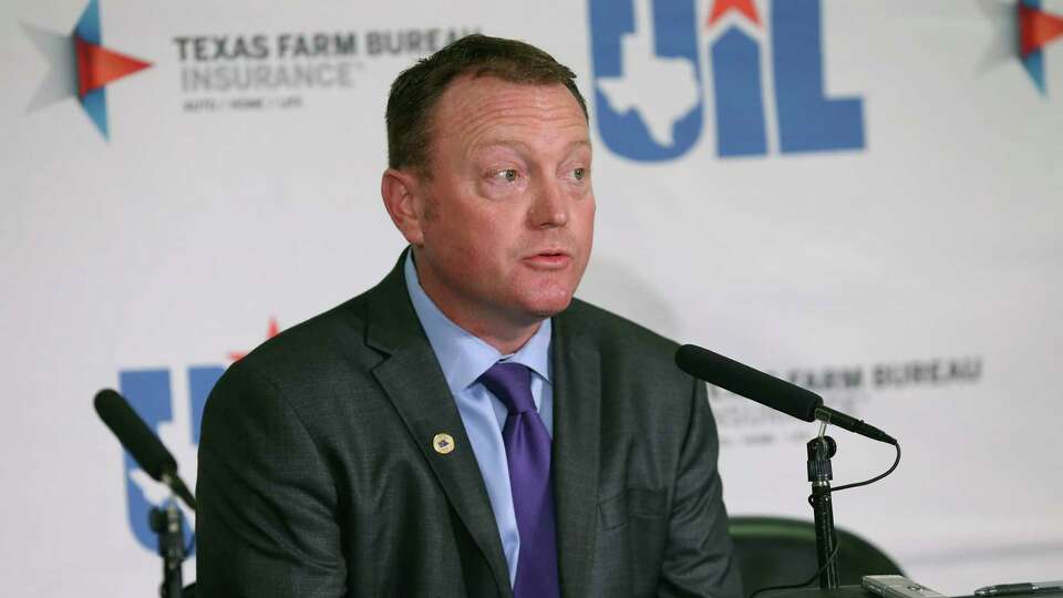 Dr. Jamey Harrison UIL Deputy Director explains actions to suspend the rest of the tourney after the class 3A state semifinal boys basketball game between Cole and Peaster at the Alamodome on Feb. 12, 2020.