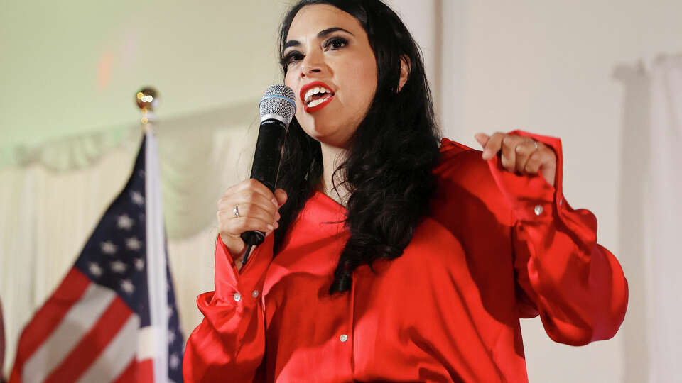 Republican Mayra Flores addresses supporters as she declares victory over her opponents for Congress in Texas District 34 as supporters cheer her on at her watch party in San Benito on Tuesday, June 14, 2022.