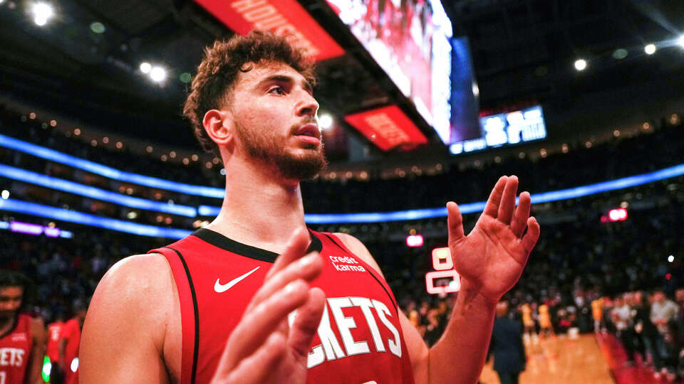 Houston Rockets center Alperen Sengun waves to the fans as he leaves the court of the Rockets’ 135-119 win over the Los Angeles Lakers in an NBA basketball game on Monday, Jan. 29, 2024 in Houston.