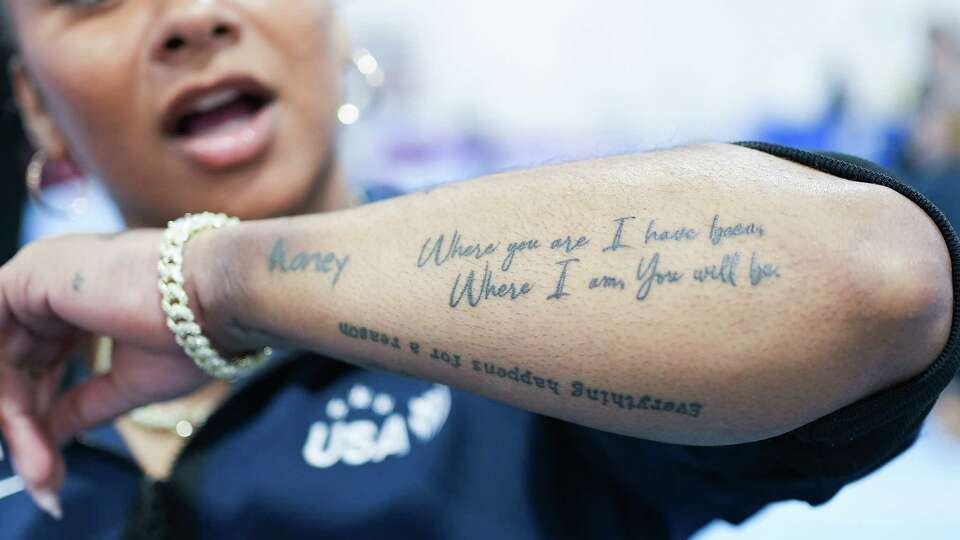 U.S. gymnast Jordan Chiles shows off a tattoo she got in honor of her grandfather during media interviews at Stars Gymnastics Training Center on Sunday, Feb. 4, 2024 in Katy.